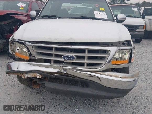 1999 Ford F-150 with VIN 1FTZX1728XNA81813, listed as a IAAI auction lot 41367154 with 149,103 mi miles and . Bid and sale history available at DreamBid. Image 6.