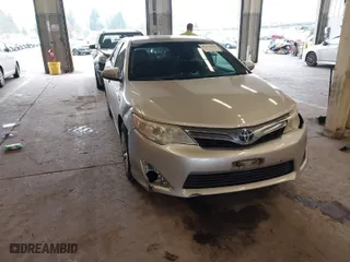 2012 Toyota Camry Hybrid XLE with VIN 4T1BD1FK8CU032960, listed as a IAAI auction lot 41318525 with 77,224 mi miles. Bid and sale history available at carsss.com. Image 1.
