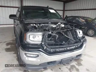 2017 GMC Sierra 1500 SLE z VIN 1GTV2MEC2HZ324763, wystawiony jako IAAI lot #42234082 z przebiegiem 106 984 mil mil oraz . Historia ofert i sprzedaży dostępna na DreamBid. Obrazek 6.