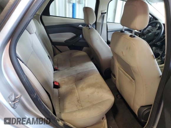 2018 Ford Focus SE z VIN 1FADP3FE9JL234158, wystawiony jako Copart lot #51788755 z przebiegiem 99 877 mil mil oraz Szkoda całkowita • Salvage title. Historia ofert i sprzedaży dostępna na DreamBid. Obrazek 10.