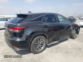 2021 Lexus RX with VIN 2T2YGMDA3MC059852, listed as a Copart auction lot 59737534 with 42,631 mi miles and Salvage Title. Bid and sale history available at carsss.com. Image 3.