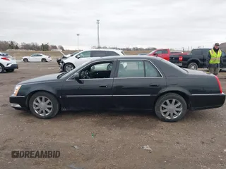 2007 Cadillac DTS Luxury I with VIN 1G6KD57Y47U175458, listed as a IAAI auction lot 41744349 with 123,227 mi miles and . Bid and sale history available at DreamBid. Image 14.