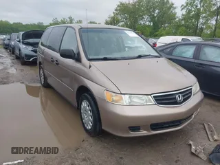 2003 Honda Odyssey LX z VIN 5FNRL18503B052965, wystawiony jako IAAI lot #42314694 z przebiegiem 199 180 mil mil oraz . Historia ofert i sprzedaży dostępna na DreamBid. Obrazek 1.