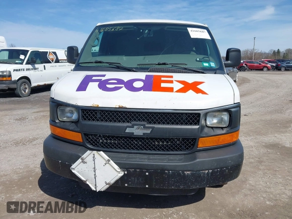 2014 Chevrolet Express Cargo Van with VIN 1GCWGFCA0E1205946, listed as a IAAI auction lot 41685687 with 317,212 mi miles. Bid and sale history available at carsss.com. Image 6.