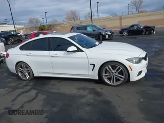 2019 BMW 4 Series 440i with VIN WBA4J5C52KBM65208, listed as a IAAI auction lot 41734154 with 52,477 mi miles and . Bid and sale history available at DreamBid. Image 14.