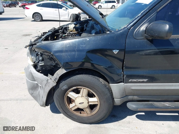 2001 Ford Escape XLT with VIN 1FMYU031X1KF31462, listed as a IAAI auction lot 41784891 with 372,527 mi miles. Bid and sale history available at carsss.com. Image 6.