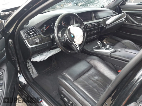 2016 BMW M5 z VIN WBSFV9C54GD595793, wystawiony jako IAAI lot #42101121 z przebiegiem 58 775 mil mil oraz . Historia ofert i sprzedaży dostępna na DreamBid. Obrazek 5.