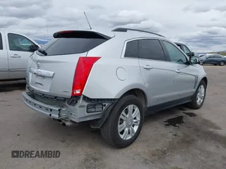 2015 Cadillac SRX with VIN 3GYFNAE34FS629258, listed as a IAAI auction lot 41788601 with 56,939 mi miles and . Bid and sale history available at DreamBid. Image 4.