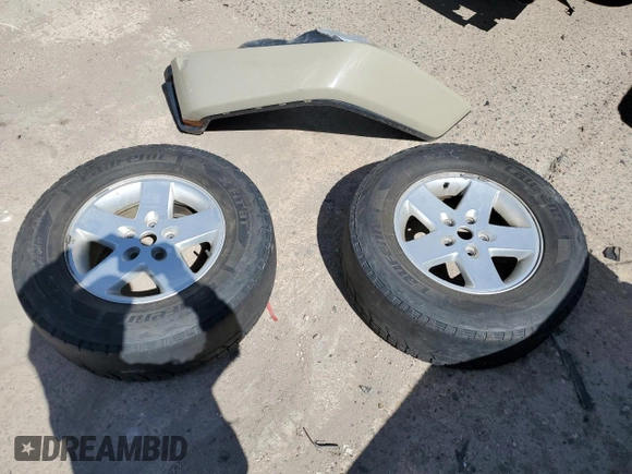 2020 Jeep Gladiator Rubicon z VIN 1C6JJTBG2LL190732, wystawiony jako Copart lot #57100115 z przebiegiem 55 679 mil mil oraz Szkoda całkowita • Salvage title. Historia ofert i sprzedaży dostępna na DreamBid. Obrazek 12.