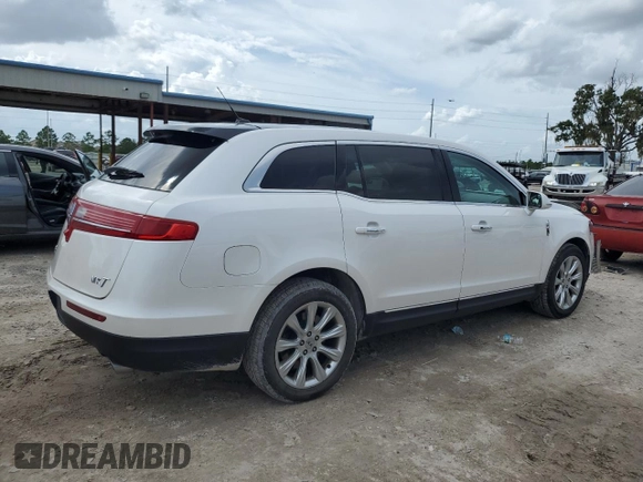 2014 Lincoln MKT with VIN 2LMHJ5FK5EBL57377, listed as a Copart auction lot 70608694 with 115,053 mi miles and Salvage Title. Bid and sale history available at DreamBid. Image 3.