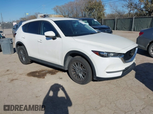 2017 Mazda CX-5 Touring with VIN JM3KFBCL8H0152748, listed as a IAAI auction lot 41732910 with 68,296 mi miles. Bid and sale history available at carsss.com. Image 1.
