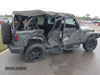 2022 Jeep Wrangler Unlimited Sport with VIN 1C4HJXDN9NW241154, listed as a IAAI auction lot 40211944 with 31,344 mi miles and . Bid and sale history available at DreamBid. Image 6.