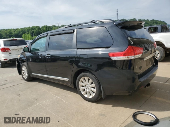 2011 Toyota Sienna XLE with VIN 5TDDK3DC6BS016463, listed as a Copart auction lot 58958305 with 270,424 mi miles and Salvage title. Bid and sale history available at DreamBid. Image 2.