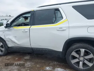 2021 Chevrolet Traverse LT with VIN 1GNERHKWXMJ218191, listed as a IAAI auction lot 41512332 with 87,206 mi miles and . Bid and sale history available at DreamBid. Image 14.
