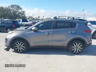 2017 Kia Sportage EX z VIN KNDPN3AC7H7233998, wystawiony jako IAAI lot #41588712 z przebiegiem 137 819 mil mil oraz . Historia ofert i sprzedaży dostępna na DreamBid. Obrazek 14.