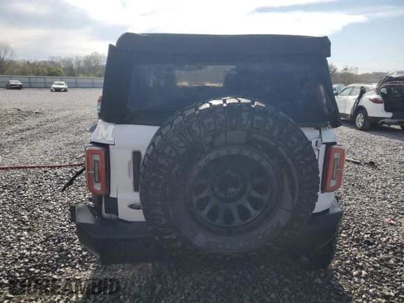 2022 Ford Bronco с VIN 1FMEE5DP6NLB41068, выставлен на аукционе Copart как лот 50778505 с пробегом 70 431 миль миль и Списание • Salvage title. История ставок и продаж доступна на DreamBid. Изображение 6.