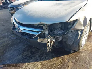 2013 Toyota Camry Hybrid LE with VIN 4T1BD1FK8DU093467, listed as a IAAI auction lot 41585354 with 239,604 mi miles. Bid and sale history available at carsss.com. Image 6.