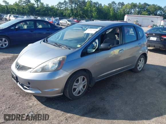 2009 Honda Fit z VIN JHMGE88289C002965, wystawiony jako IAAI lot #42382336 z przebiegiem 120 727 mil mil oraz . Historia ofert i sprzedaży dostępna na DreamBid. Obrazek 2.