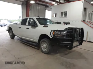 2023 Ram 2500 Tradesman with VIN 3C6UR5HJ1PG606549, listed as a IAAI auction lot 40241030 with 36,958 mi miles. Bid and sale history available at carsss.com. Image 1.