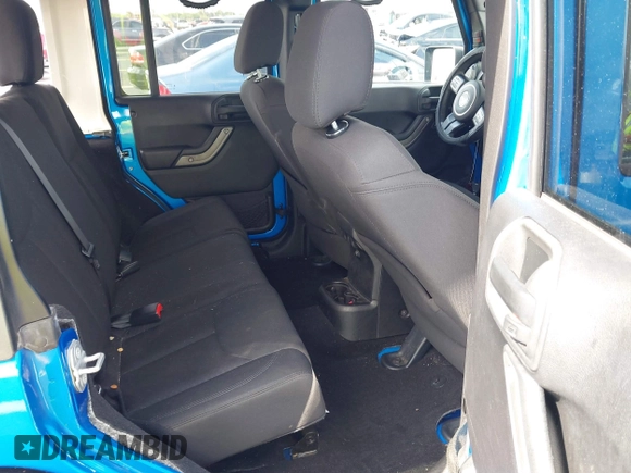 2015 Jeep Wrangler Unlimited Sport with VIN 1C4BJWDG1FL716400, listed as a IAAI auction lot 42645745 with 83,199 mi miles and . Bid and sale history available at DreamBid. Image 8.