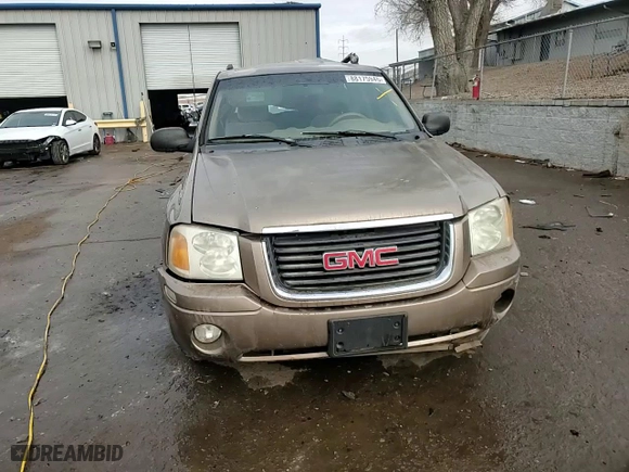 2003 GMC Envoy SLT with VIN 1GKDS13S432372114, listed as a Copart auction lot 88175945 with 114,138 mi miles and Salvage Title. Bid and sale history available at carsss.com. Image 11.