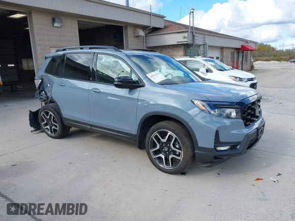 2023 Honda Passport Elite with VIN 5FNYF8H03PB000039, listed as a IAAI auction lot 40593339 with 33,697 mi miles and . Bid and sale history available at DreamBid. Image 1.
