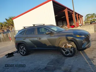 2022 Hyundai Tucson SEL z VIN 5NMJCCAE0NH149457, wystawiony jako IAAI lot #42166988 z przebiegiem 51 930 mil mil oraz . Historia ofert i sprzedaży dostępna na DreamBid. Obrazek 13.