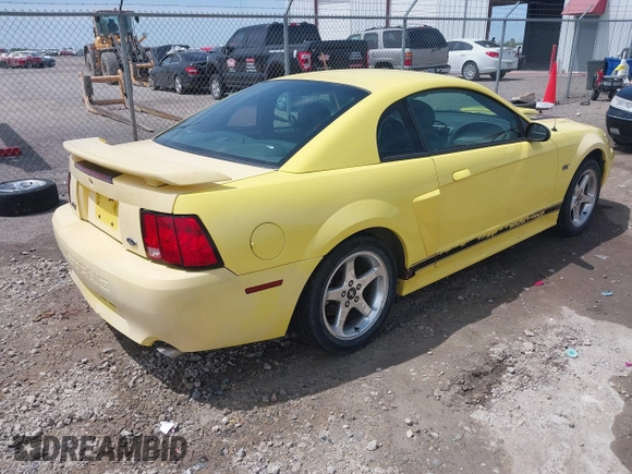 2003 Ford Mustang GT Deluxe z VIN 1FAFP42X43F394679, wystawiony jako IAAI lot #42129223 z przebiegiem 135 472 mil mil oraz . Historia ofert i sprzedaży dostępna na DreamBid. Obrazek 4.
