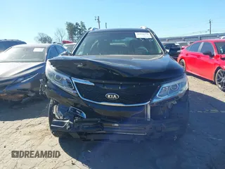 2014 Kia Sorento LX with VIN 5XYKTCA66EG483726, listed as a IAAI auction lot 41829970 with 102,294 mi miles and . Bid and sale history available at carsss.com. Image 12.