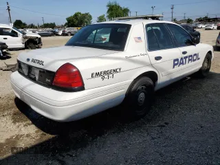 2011 Ford Police Interceptor z VIN 2FABP7BV7BX131779, wystawiony jako Copart lot #59364255 z przebiegiem 118 964 mil mil oraz Czysty tytuł • Clean title. Historia ofert i sprzedaży dostępna na DreamBid. Obrazek 3.