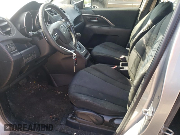 2014 Mazda 5 Sport with VIN JM1CW2BLXE0168024, listed as a Copart auction lot 55010995 with 204,562 mi miles and Salvage title. Bid and sale history available at DreamBid. Image 7.