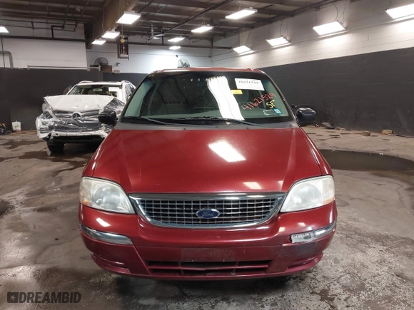 2002 Ford Windstar Wagon SE with VIN 2FMZA52442BB60882, listed as a IAAI auction lot 41621529 with 136,753 mi miles. Bid and sale history available at carsss.com. Image 12.