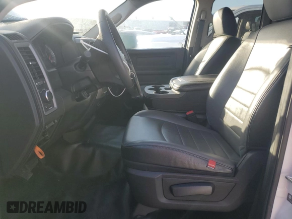 2023 Ram 1500 Tradesman with VIN 1C6RR6FG9PS534852, listed as a Copart auction lot 44083285 with 14,601 mi miles and Salvage title. Bid and sale history available at DreamBid. Image 7.