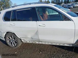 2023 BMW X7 xDrive40i with VIN 5UX23EM08P9N90606, listed as a IAAI auction lot 41692128 with 34,752 mi miles. Bid and sale history available at carsss.com. Image 14.