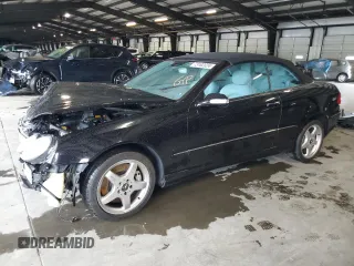 2004 Mercedes-Benz CLK 500 with VIN WDBTK75G34T031610, listed as a Copart auction lot 73182024 with 107,955 mi miles and Salvage Title. Bid and sale history available at DreamBid. Image 1.