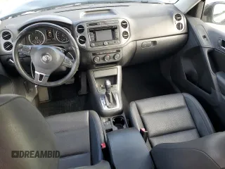 2013 Volkswagen Tiguan SE z VIN WVGBV7AXXDW534779, wystawiony jako Copart lot #77397164 z przebiegiem 149 285 mil mil oraz Szkoda całkowita • Salvage title. Historia ofert i sprzedaży dostępna na DreamBid. Obrazek 8.