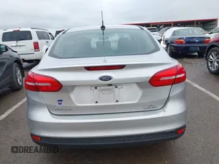 2015 Ford Focus SE с VIN 1FADP3F26FL254588, выставлен на аукционе IAAI как лот 42146381 с пробегом 99 280 миль миль и . История ставок и продаж доступна на DreamBid. Изображение 16.