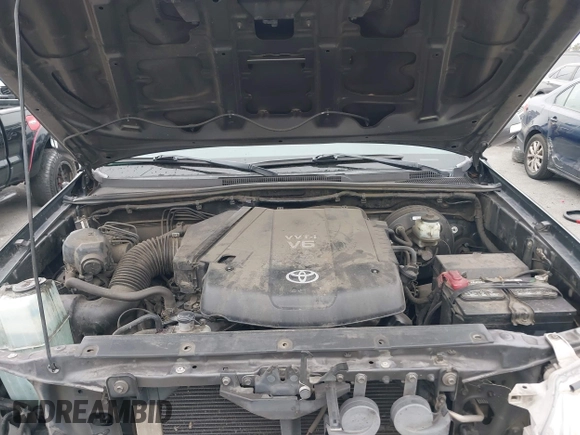2014 Toyota Tacoma PreRunner with VIN 3TMKU4HN9EM041509, listed as a IAAI auction lot 42441194 with 290,715 mi miles and . Bid and sale history available at DreamBid. Image 10.
