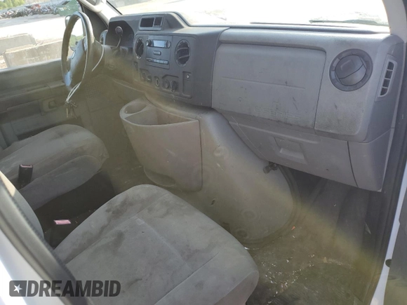 2012 Ford Econoline Cargo Commercial with VIN 1FTNE2EL0CDB33215, listed as a Copart auction lot 63120784 with 258,466 mi miles and Salvage title. Bid and sale history available at DreamBid. Image 8.