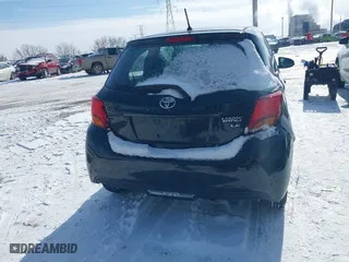 2015 Toyota Yaris L with VIN VNKJTUD34FA055116, listed as a IAAI auction lot 41601874 with 84,508 mi miles. Bid and sale history available at carsss.com. Image 16.