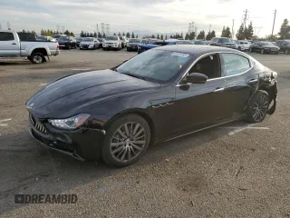 2021 Maserati Ghibli with VIN ZAM57XSA5M1369156, listed as a Copart auction lot 82876193 with 19,415 mi miles. Bid and sale history available at carsss.com. Image 1.