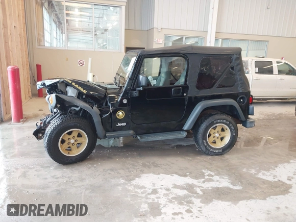 2006 Jeep Wrangler Sport with VIN 1J4FA49S96P733712, listed as a IAAI auction lot 41572913 with 93,511 mi miles. Bid and sale history available at carsss.com. Image 14.