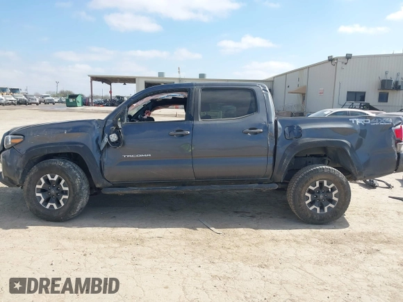 2021 Toyota Tacoma 4WD SR with VIN 3TMCZ5AN4MM387519, listed as a IAAI auction lot 41769922 with 61,813 mi miles. Bid and sale history available at carsss.com. Image 15.