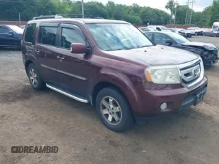 2011 Honda Pilot Touring z VIN 5FNYF4H98BB001042, wystawiony jako IAAI lot #42726066 z przebiegiem 282 615 mil mil oraz . Historia ofert i sprzedaży dostępna na DreamBid. Obrazek 1.