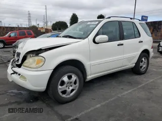 2004 Mercedes-Benz M-Class 3.5L with VIN 4JGAB57E74A501184, listed as a Copart auction lot 77801184 with 0 mi miles and Salvage Title. Bid and sale history available at carsss.com. Image 1.