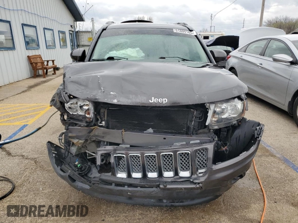 2014 Jeep Compass Latitude with VIN 1C4NJDEB4ED904731, listed as a Copart auction lot 51809165 with 104,760 mi miles and Salvage Title. Bid and sale history available at DreamBid. Image 5.