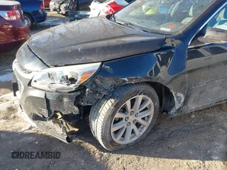 2014 Chevrolet Malibu LT with VIN 1G11E5SL0EF293535, listed as a IAAI auction lot 41373511 with 167,743 mi miles and . Bid and sale history available at DreamBid. Image 6.