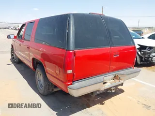 1998 GMC Suburban with VIN 3GKEC16R0WG507627, listed as a IAAI auction lot 42473984 with 200,064 mi miles and . Bid and sale history available at DreamBid. Image 3.