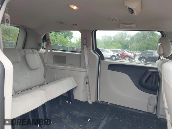 2013 Dodge Grand Caravan SE with VIN 2C4RDGBG8DR505844, listed as a IAAI auction lot 42139152 with 206,399 mi miles and . Bid and sale history available at DreamBid. Image 8.