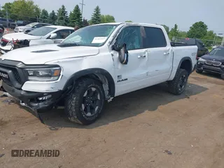 2022 Ram 1500 Rebel with VIN 1C6SRFLT5NN318494, listed as a IAAI auction lot 42413194 with 59,458 mi miles and . Bid and sale history available at DreamBid. Image 17.